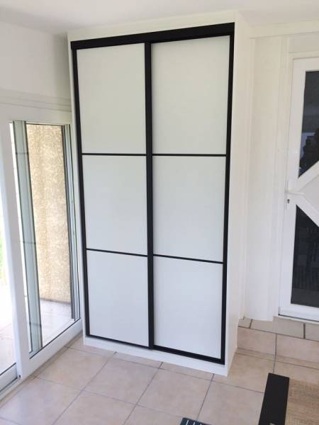Installation d'un placard sur mesure dans une véranda à Le Neubourg proche de Evreux